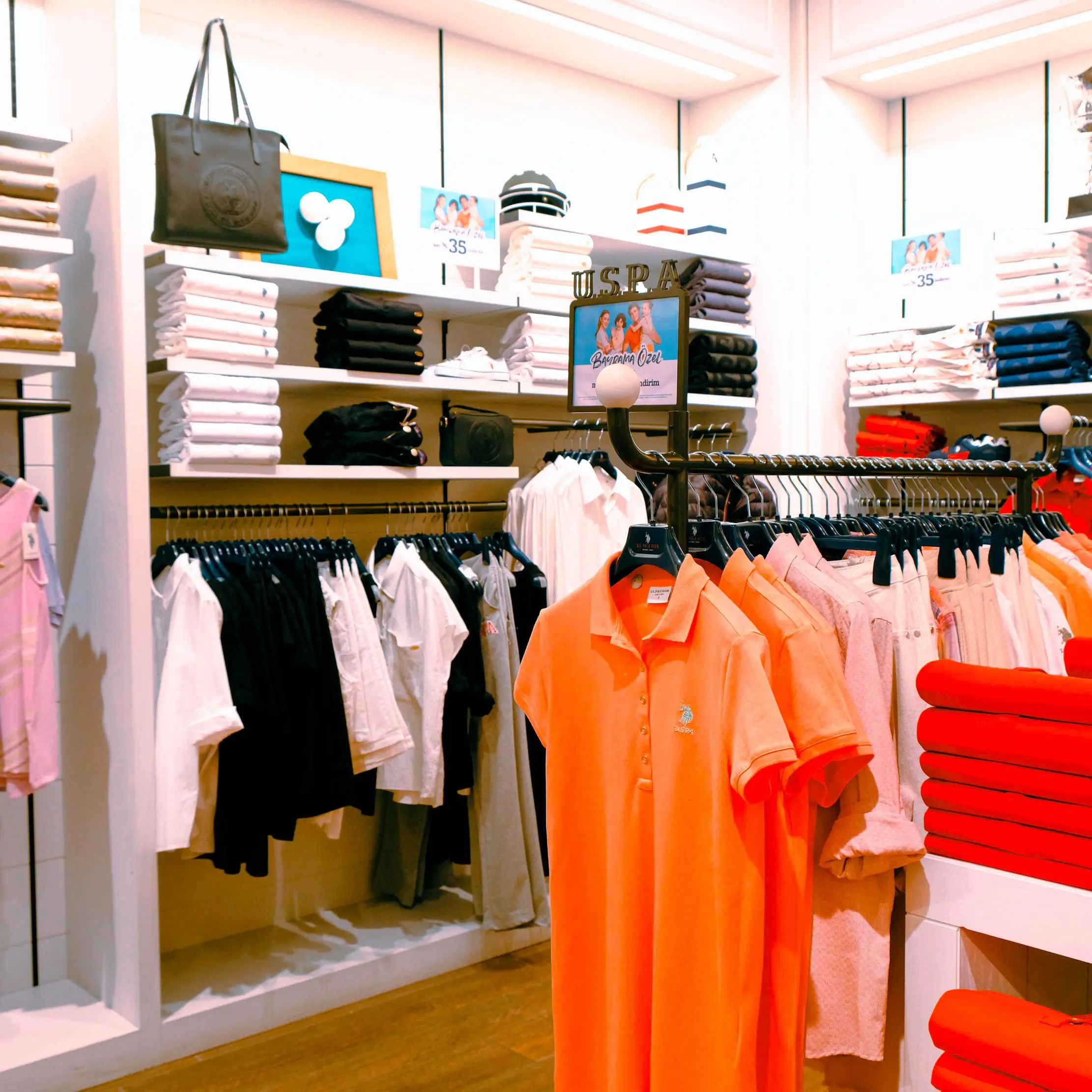 Clothing displays in a fashion shop, illustrating Maduuka size, variant, and catalogue workflows