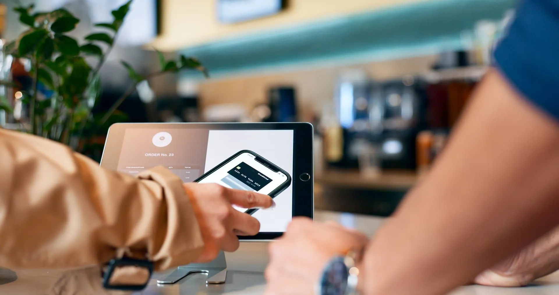 Restaurant point-of-sale payment scene focused on checkout flow rather than faces