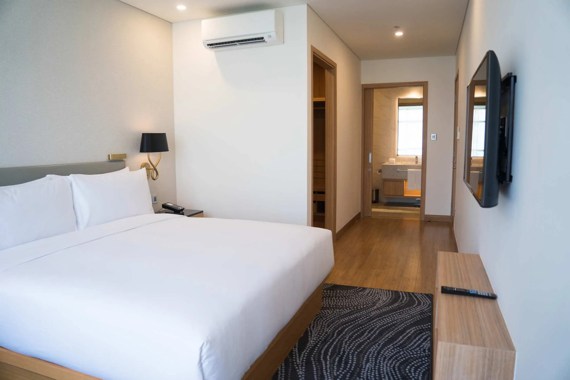 Clean hotel room managed through Maduuka housekeeping module